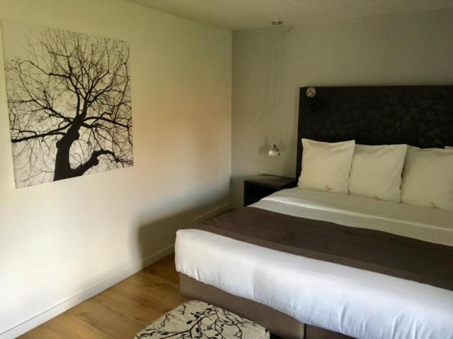 One or more beds in accommodation at Casa9 Hotel
