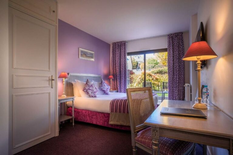 Un ou plusieurs lits dans un hébergement de l’établissement Best Western Plus Hostellerie Du Vallon