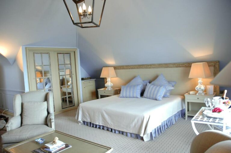 Одна или несколько кроватей в отеле Manoir de Lan Kérellec