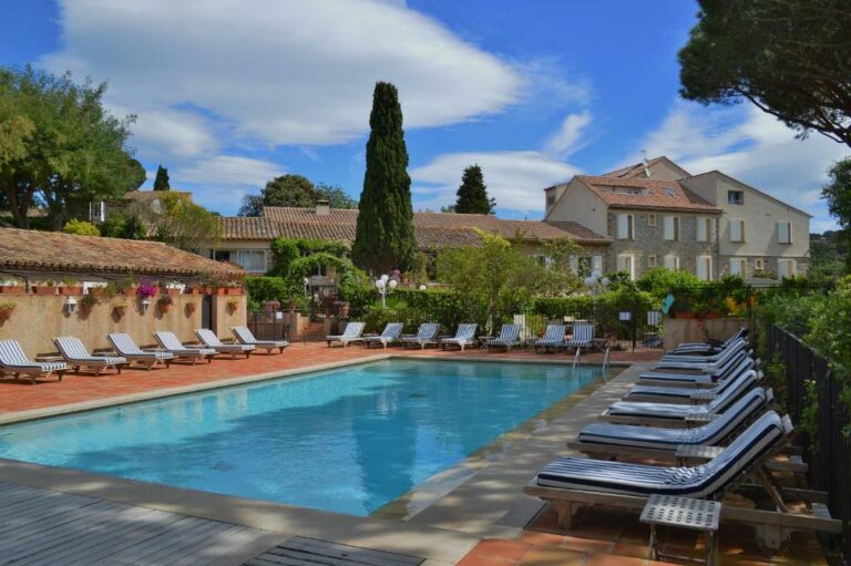 Swimming pool at La Ferme D'Augustin or located nearby