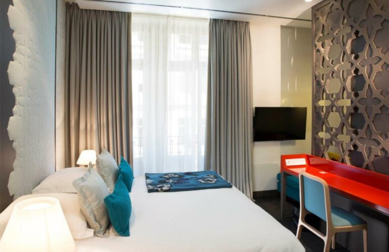 Un ou plusieurs lits dans un hébergement de l’établissement Hotel D – Strasbourg