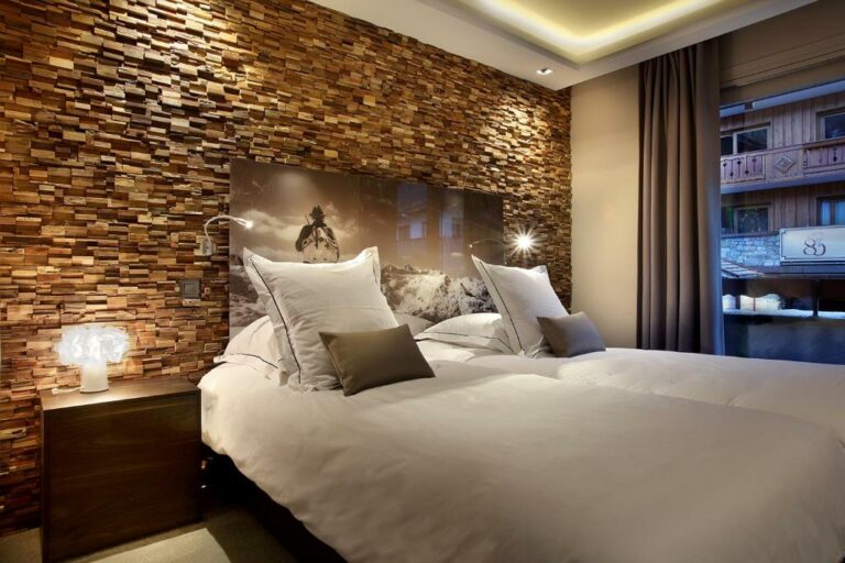 Одна или несколько кроватей в номере отеля Le Tremplin