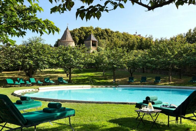 Swimming pool at Château de Bagnols or located nearby