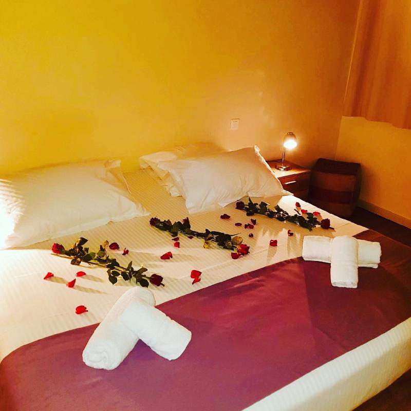 Un ou plusieurs lits dans un hébergement de l'établissement Hotel Les Hauts de Porto-Vecchio