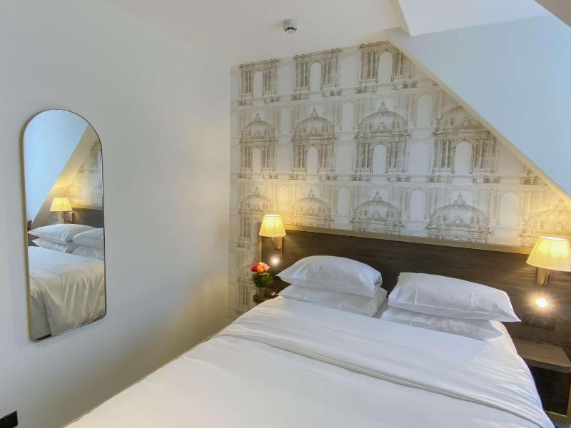 Un ou plusieurs lits dans un hébergement de l'établissement Best Western Royal Hotel Caen